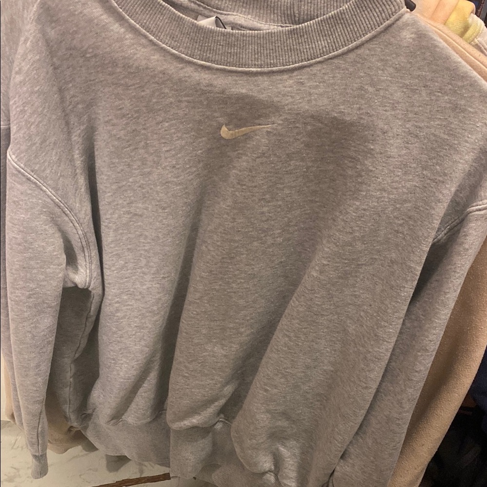 Nike Gray Sweatshirt size is xxs but it fits more like a small or medium